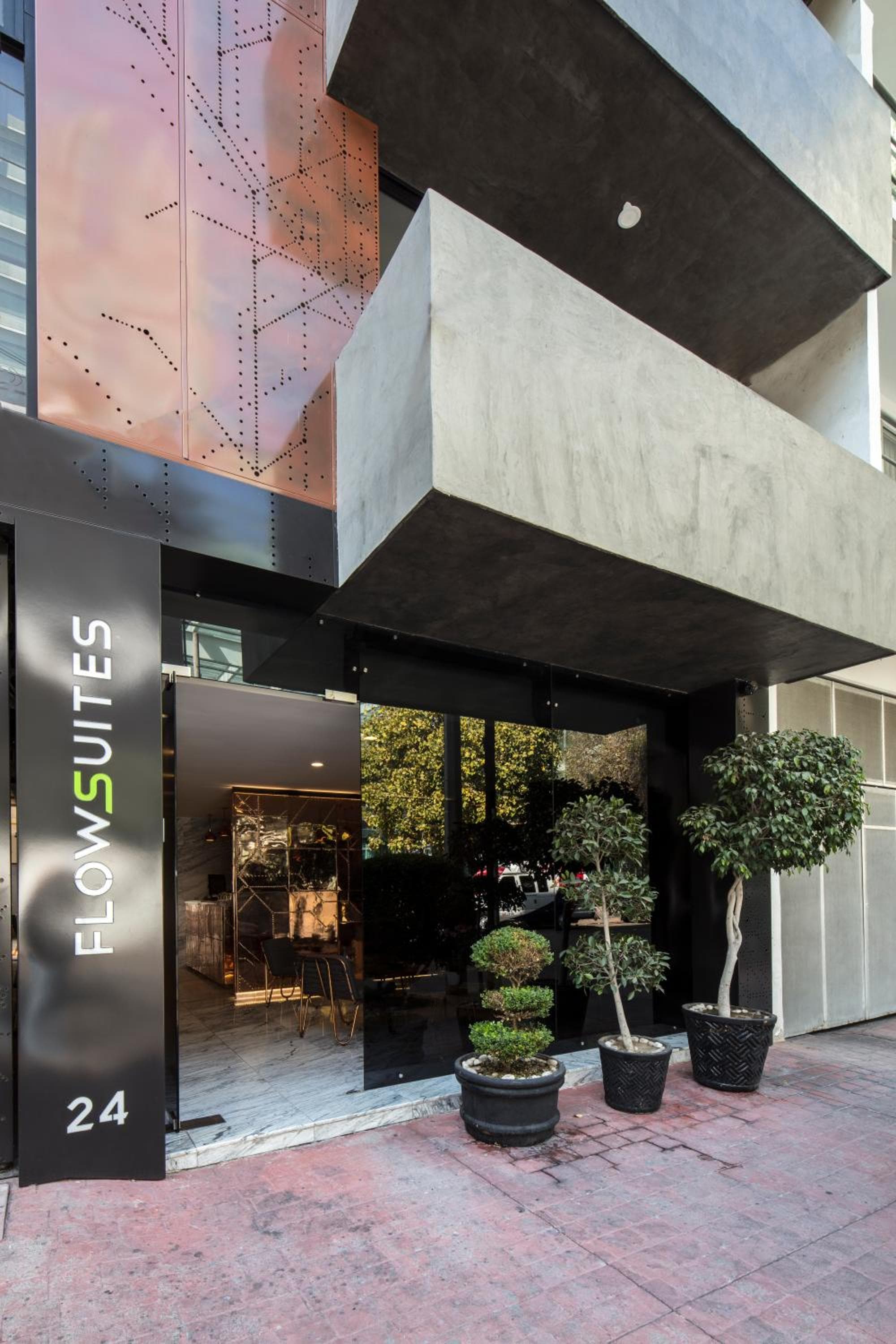 FlowSuites WTC — 1