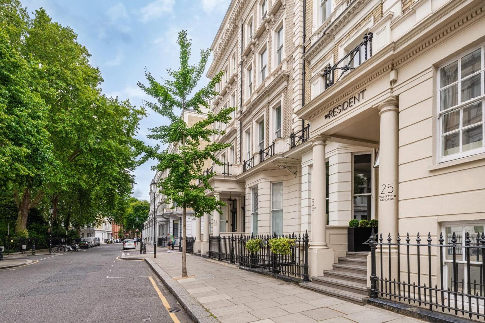 El residente Kensington — 25