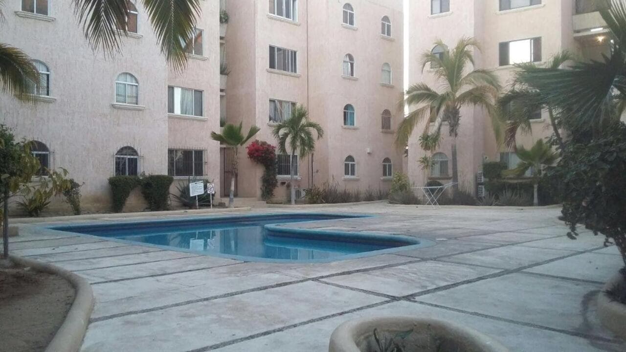 Coromuel Condo — 1