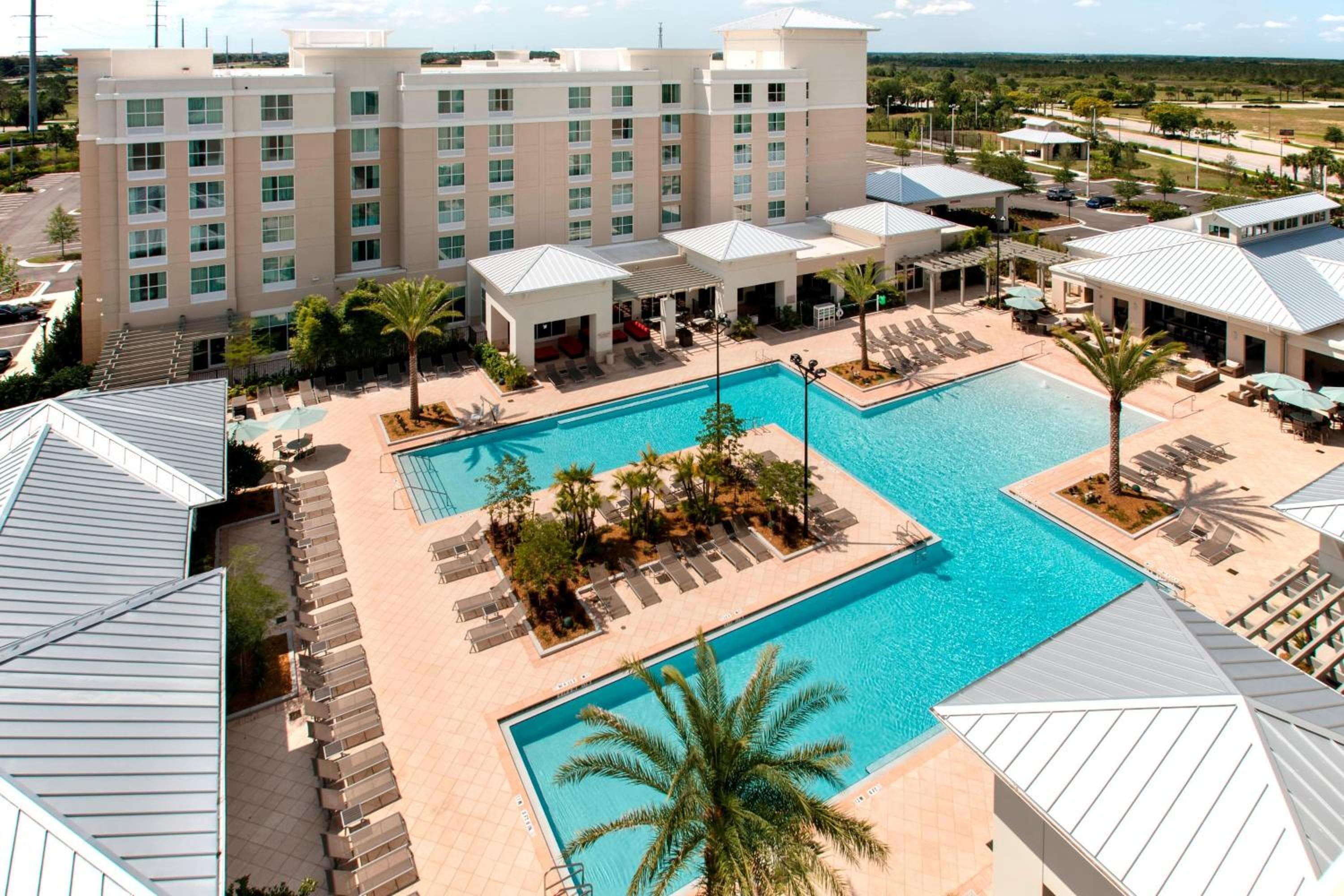 TownePlace Suites Orlando at FLAMINGO CROSSINGS Town Center, Western Entrance — 7