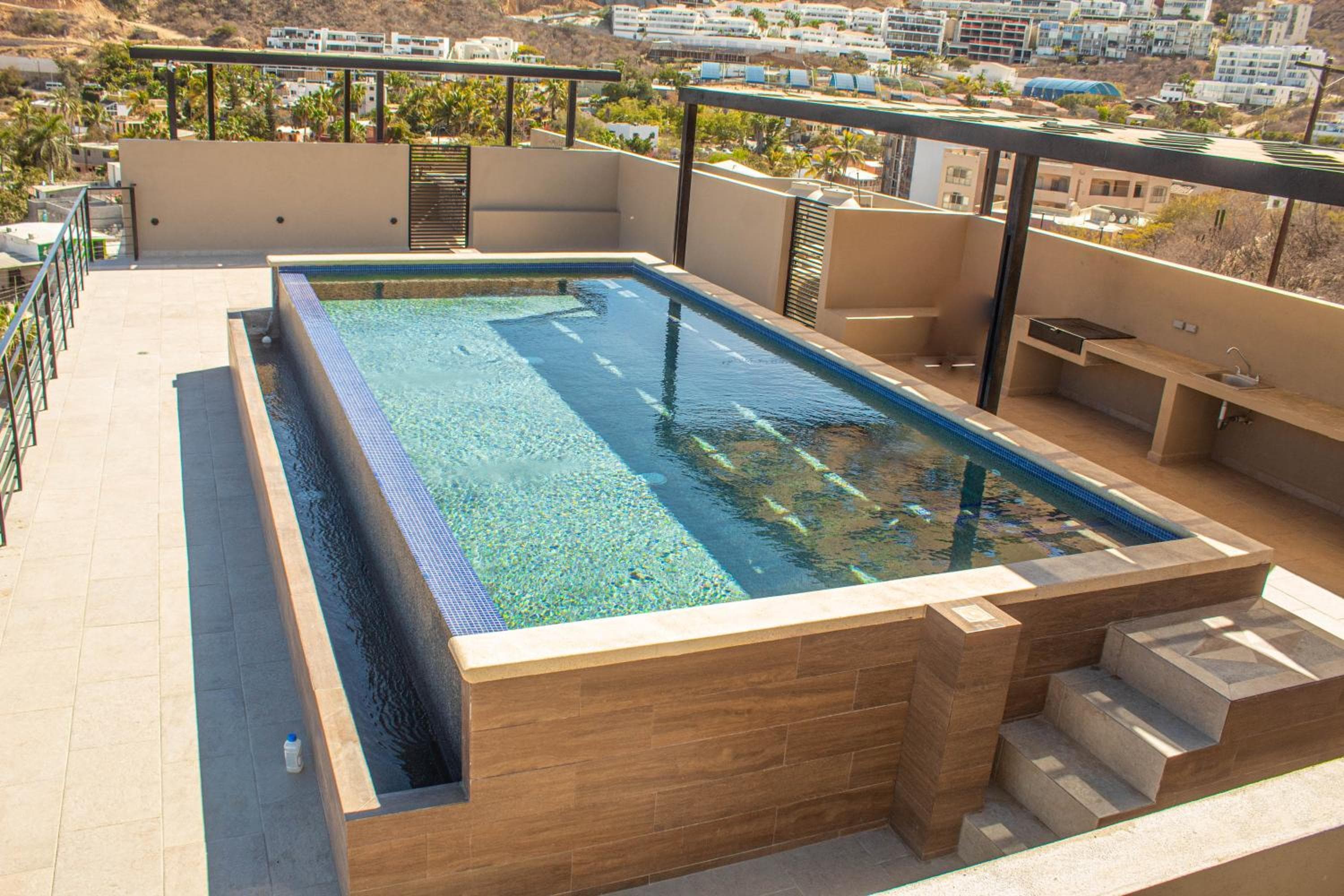 NUOVO condominio Terra con piscina a sfioro — 13