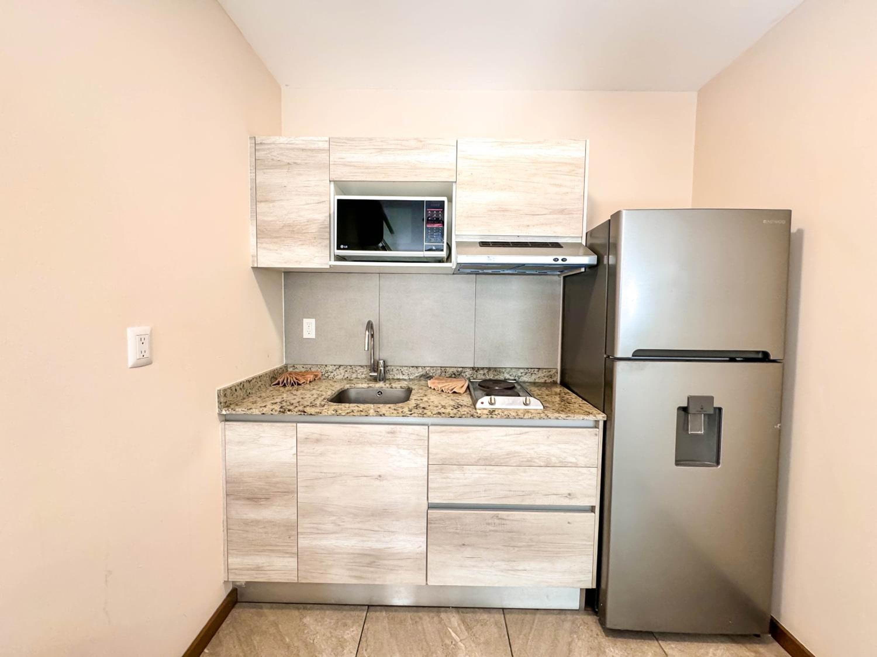 Grand Fifty Suites — 23