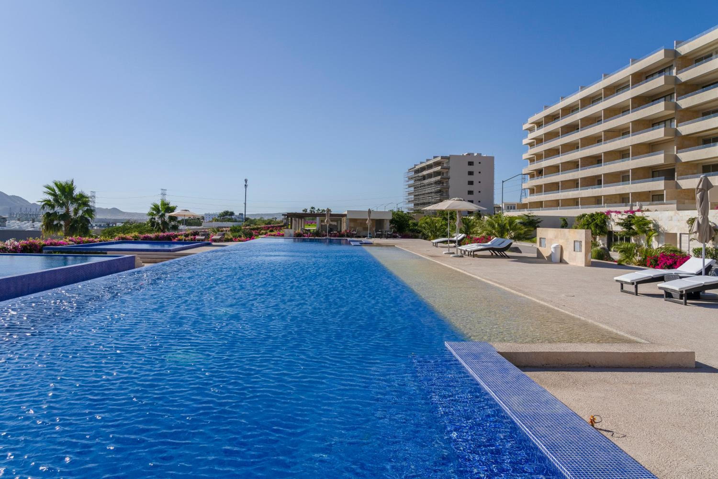 Luxury Condo with Ocean View, Balcony, and Pool — 10